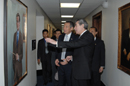 Secretary Gutierrez and Prime Minister Lee Hsien Loong pause for a moment to view paintings of past secretaries