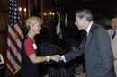 Secretary Gutierrez shakes hands with CFC winner