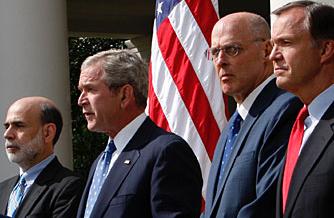 President Bush speaks about the economy in the Rose Garden of the White House along with Federal Reserve Chairman Ben Bernanke, left, Treasury Secretary Henry Paulson, second from right, and SEC Chairman Christopher Cox.