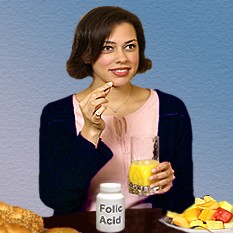 Photo of women taking vitamins containing folic acid and drinking orange juice
