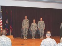 FORT JACKSON, SC - COL Manning, COL Reinwald and COL Mustion take their places as the ceremony begins. (Photo by CW5 Jeanne Y. Pace)