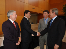 Dr. Zerhouni greets  President George W. Bush in the Clinical Research Center.