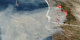 This image shows San Diego, California on October 27, 2003.  Red fire pixels have been laid on top of the Aqua-MODIS image to show the
start of each incident fire.