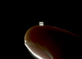 Chip-scale vapor cell on a fingertip