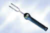 Picture of a thermometer-fork combination that displays the temperature digitally in the handle.