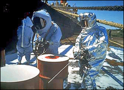 Working with chemical drums.