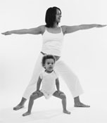 Photo of a pregnant woman exercising with kid