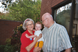 older couple with toddler