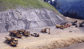 Image of mountain highway construction with rock cut