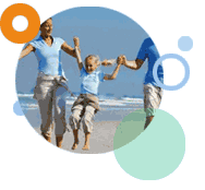 Image of family walking on beach
