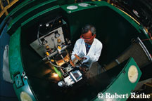 researcher working with fuel cells