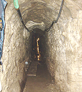 Photo shows a drug tunnel 

discovered by members of the San Diego Tunnel Task Force.