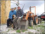 Roland Smith (left) and his son, Howard, have created wildlife food plots on their land in Bennington. Image by Peter Crabtree, Rutland Herald