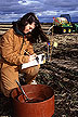 Technician Amy Baker performs soil water infiltration studies.