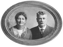 Old photograph of a woman and a man in an oval picture frame  (Copyright, Rights reserved.)