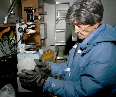 Scientist holding large hailstone