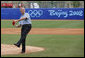 President George W. Bush throws out the first pitch at the Men’s Olympic Baseball practice with Team USA and Team China, Monday, Aug. 11, 2008. White House Photo by Eric Draper White House photo by Eric Draper