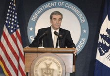 Secretary Gutierrez at podium.