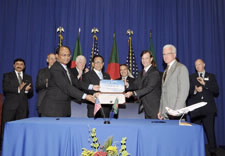 Under Secretary Padilla and various officials posed with signed contract.