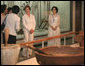 Mrs. Laura Bush visits the National Folk Museum of Korea Wednesday, Aug. 6, 2008, in Seoul. At right is Lee Ki Won, the museum's Deputy Director of Cultural Exchange and Education. White House photo by Shealah Craighead
