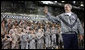 President George W. Bush waves as he is welcomed by U.S. military personnel before delivering his remarks Wednesday, Aug. 6, 2008, at the U.S. Army Garrison-Yongsan in Seoul. White House photo by Eric Draper