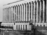 black and white photo of Treasury's exterior extrance leading to the colonnade