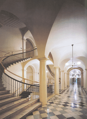 color photo of Treasury corridor showing spiral staircase