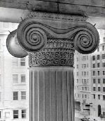black and white photo of the Ionic capital used for the Treasury building