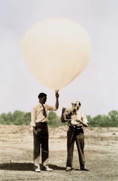 two men with weather balloon