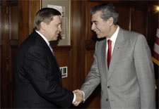 Secretary Gutierrez and Ambassador Ushakov shaking hands.