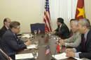 Dep. Secy. Sampson and staff hold a table discussion with the Vietnamese Deputy Prime Minister delegation