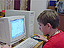 Harry Swan sitting at a computer