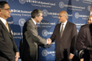 Secy Gutierrez shakes hands with a member of U.S. India Cooperation Group