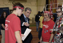 Secy Gutierrez interacts with students during the Chesapeake Regional Robotics Competition