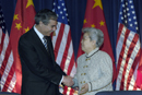 Secretary Gutierrez shakes hands with Vice Premier Wu Yi after signing ceremony