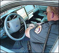 Police officer in patrol car