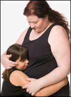 Photo of an overweight mother and daughter