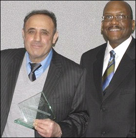 Dr. Tomeh (left) with Atlanta Special Agent in Charge Gregory Jones