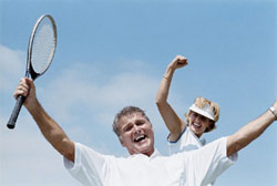 photo of a couple playing tennis