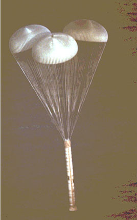 SRB parachutes to Earth