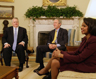 Sudan Envoy Rich Williamson, President Bush and Secretary Rice meet at the White House. AP photo.