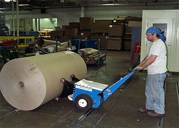 Figure 2: After: using battery-powered roll pusher to move roll