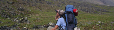 Carolyn looking through her bnoculars.