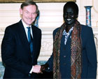 Deputy Secretary Zoellick greeting Rebecca Garang, Sudanese Minister of Roads. [State Department photo]