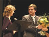 Halyna Kravets receives a Civil Society Award from Minister of Family, Youth and Sports' Yuriy Pavlenko at the 2005 IOM Annual Awards Ceremony