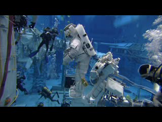 <b>13. SM4 Neutral Buoyancy Lab B-roll:</b> B-roll of Goddard Space Flight Center engineers working with astronauts in NASA's Neutral Buoyancy Lab at the Johnson Space Center in Houston. These runs are part of the STS-125 crew’s training to service Hubble. The runs also help Goddard engineers develop and refine the crew aides, tools and techniques to be used during Servicing Mission 4.