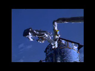 <b>24: HST Archival Film Highlights: Servicing Mission 1 Highlights (SM1):</b> Highlights from upconverted 16mm film B-roll of Servicing Mission 1 (SM1). Includes crew training, EVA highlights, HST deployment, MOCR activities and COR activities, Corrective Optics Space Telescope Axial Replacement (COSTAR) installation to counter effects of the flawed shape of the mirror; solar array jettison and more. NOTE: approximately 5-hours of 16mm film related to Hubble missions is now available in high definition. Contact the Public Affairs Officers for more information.