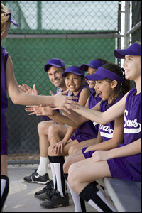 Photo: Teenage girls on a  softball team.