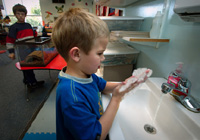 boy washing hands