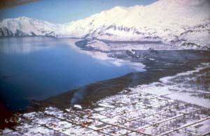 Aerial image of Valdez, Alaska, showing the extent of inundation along the coastline following the tsunami generated by an earthquake on March 27, 1964.